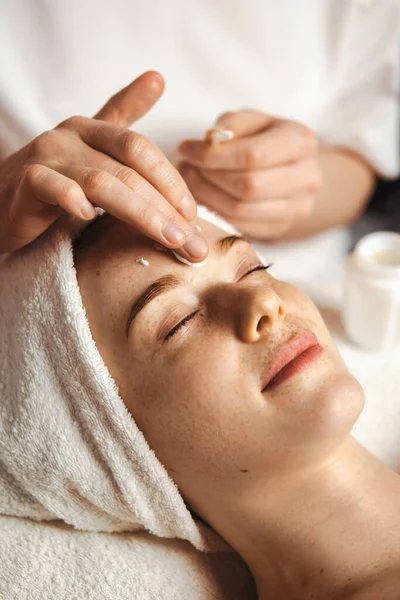 Beautician Applying Cosmetic Cream Patients Face Spa Salon Happy Face — Stockfoto