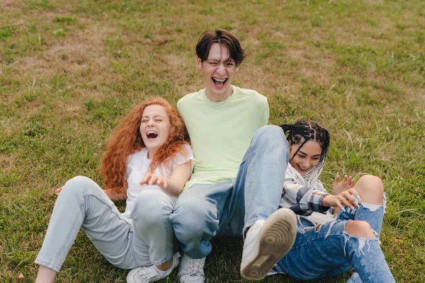 Three Happy Teenagers Fell Grass While Making Video Post Internet — Stock Fotó