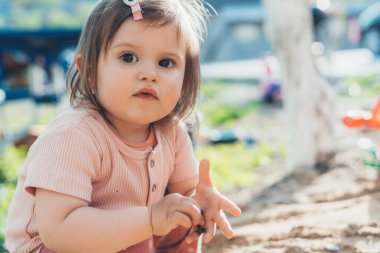 Spring, summer garden. Baby development. Healthy active lifestyle. Summer outdoor fun activity.