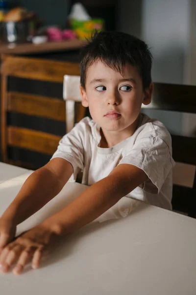 Cheerful Boy Sitting Table Kitchen Wait His Mother Make Him — Stock Photo, Image