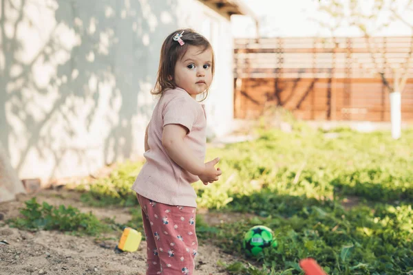 Portrait Caucasian Baby Girl Standing Summer Garden Thoughtful Look Looking — Stock Photo, Image