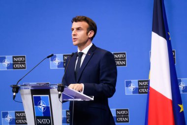 BRÜZSEL, BELGIUM. 24 Mart 2022. Emmanuel Macron, Fransa Cumhurbaşkanı, NATO Olağanüstü Zirvesi 'nden sonra düzenlediği basın toplantısında. Brüksel, Belçika