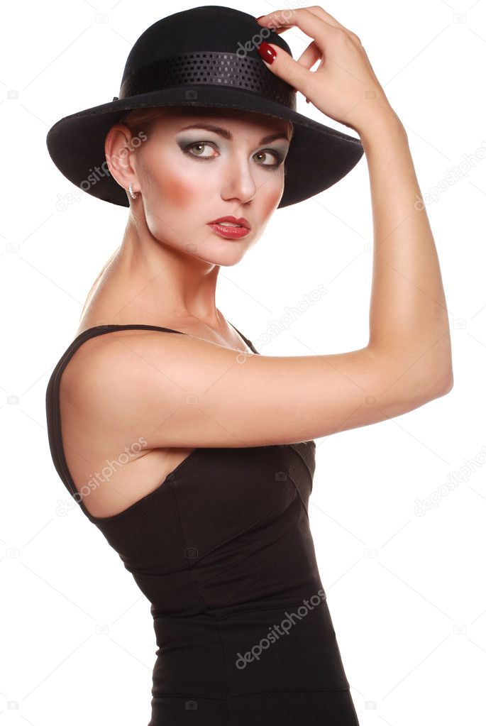 Elegant blonde model in classic black dress