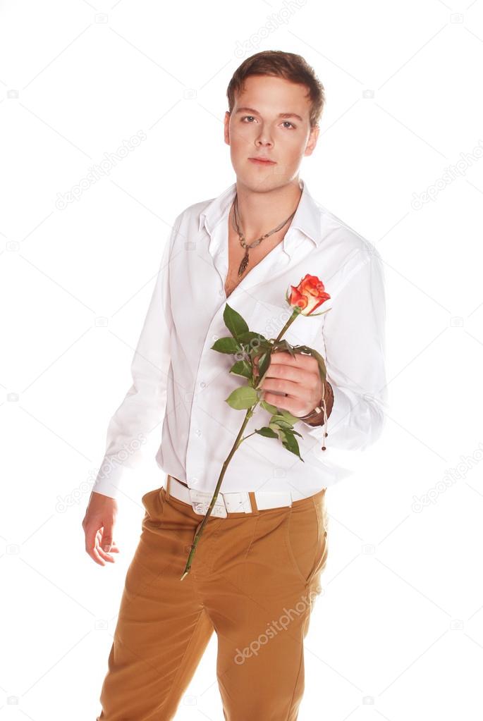 Cute young man with rose