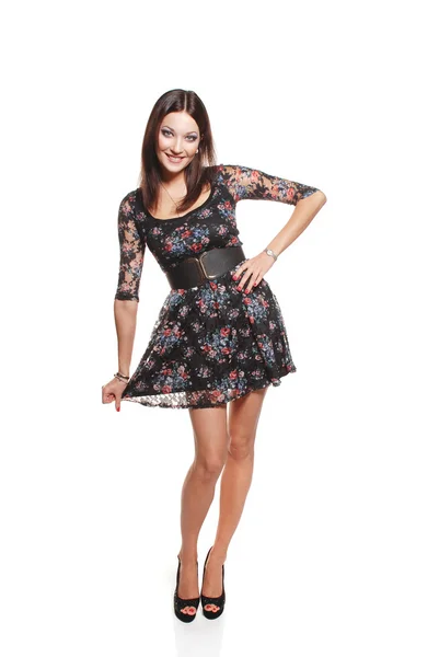 Glad lekfull tjej i klänning — Stockfoto