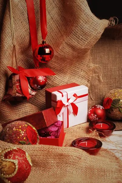 Christmas still life with presents and candles — Stock Photo, Image