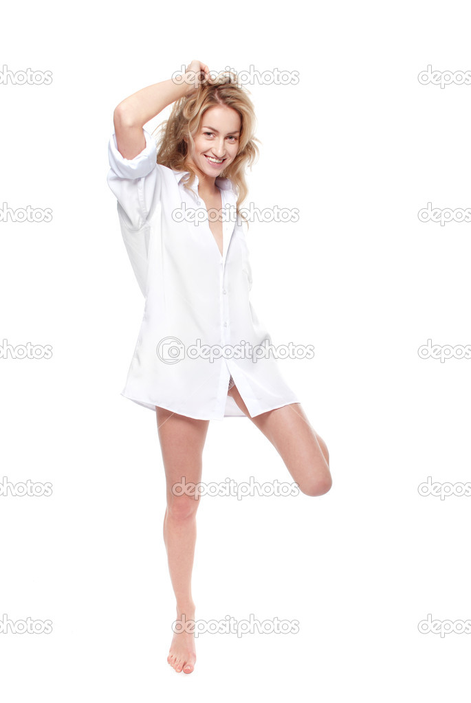 Happy blonde lady in white shirt