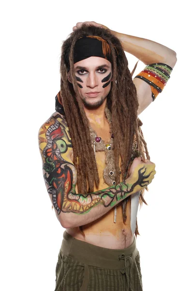 Musicista selvaggio con body art Foto Stock Royalty Free