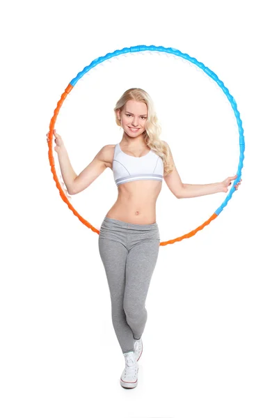 Fitness ragazza con hula hoop Foto Stock