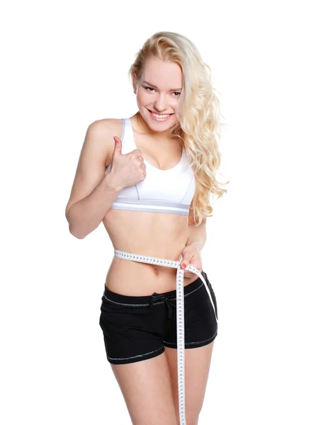 Menina Fitness atraente isolado no branco Imagens De Bancos De Imagens