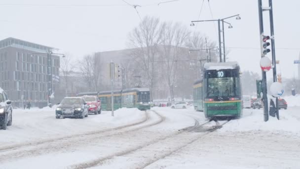 ForCity Smart Artic Helsinki tram on the street — Stockvideo