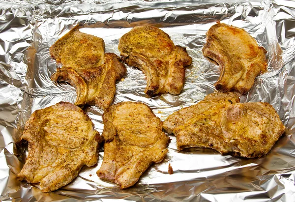 The baked Meat in a foil — Stock Photo, Image