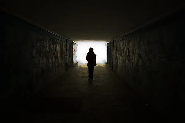 Silhouette in a subway tunnel — Stock Photo, Image