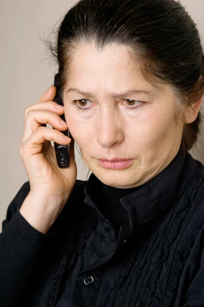 Portrait of the woman speaking by phone — Stock Photo, Image