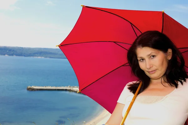 Woman near the sea — Stock Photo, Image