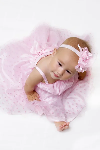 Bebé niña en vestido rosa . — Foto de Stock