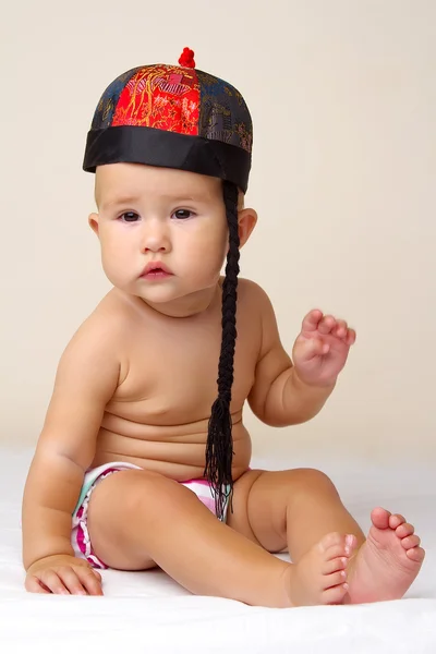 Baby a čínský Nový rok klobouk. — Stock fotografie