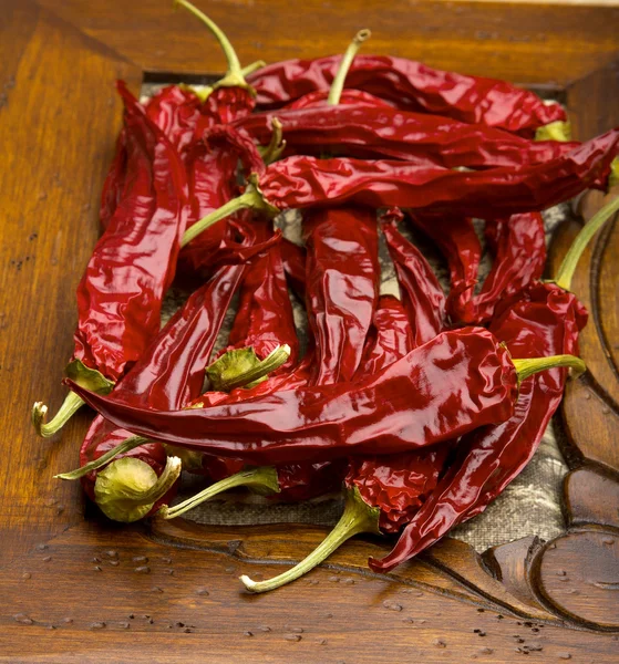 Pepper on wooden background — Stock Photo, Image