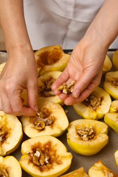 Preparation of quince with honey and nuts — Stock Photo, Image