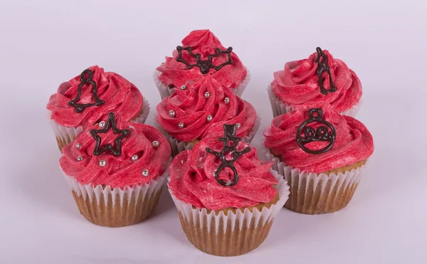 Group of Christmas cupcakes on white background — Stock Photo, Image