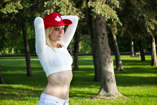 Sexy young Canadian girl with red cowboy hat — Stock Photo, Image