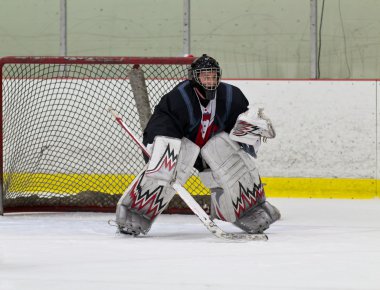 Hokey goaltender kaydetmek için hazır