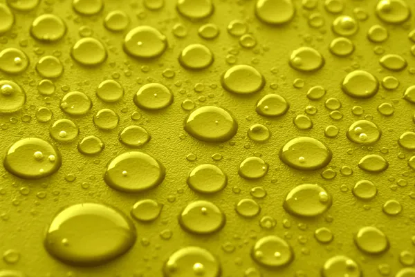 Yellow water drops — Stock Photo, Image