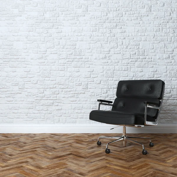 Intérieur mural en brique blanche avec fauteuil de bureau en cuir noir — Photo