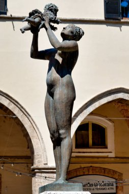 Statue of motherhood in Piazza Orsini, Teramo Italy