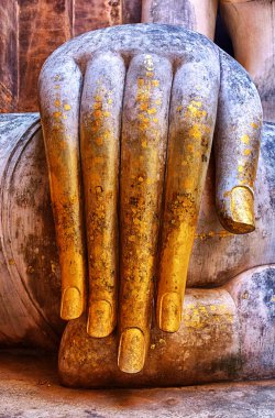 Detail of the hand of Phra Acana in Wat Si Chum, Sukhothai, Thailand