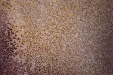 Eski bir çömlek. Yakın plan. Arka plan, doku. Sıcak renk tonları, turuncu.