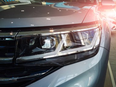 New cars in the Volkswagen showroom. The concept of buying a car, insurance, trade in. 01/16/2022 Yekaterinburg, Russia.