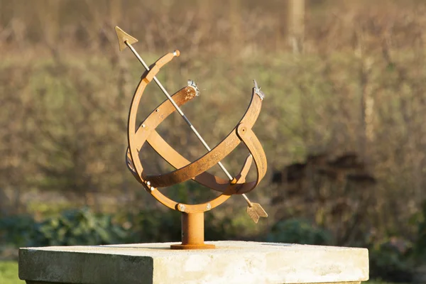 Iron sundial in the garden ancient clock — Stock Photo, Image