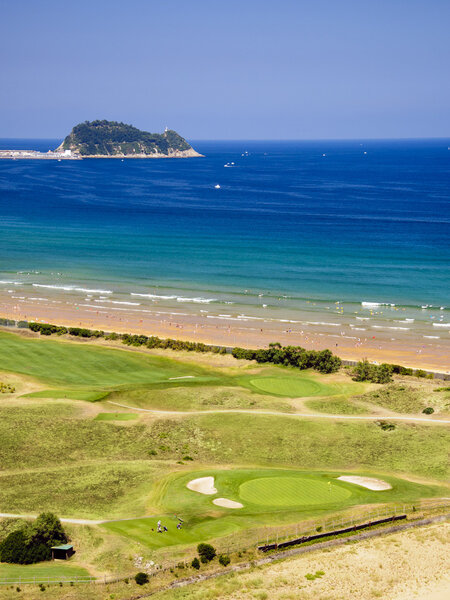 Beach and golf course of Zarautz with Guetaria on the background