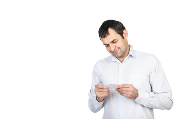 Man looks at the card — Stock Photo, Image