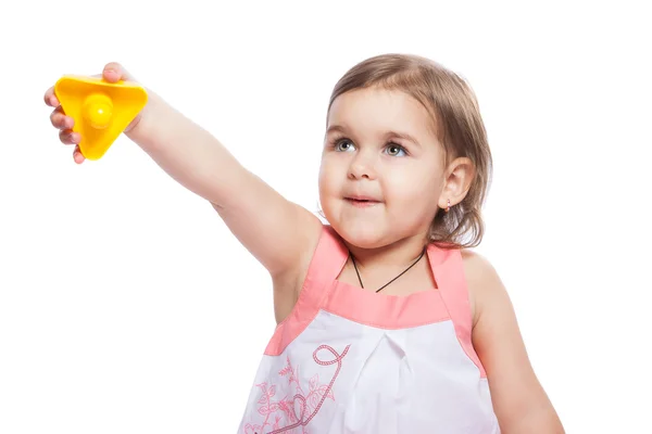 Little girl with a yellow puzzle — Stock Photo, Image