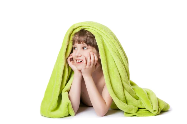 Flicka i en grön handduk — Stockfoto