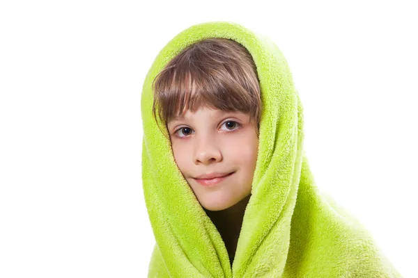 Flicka i en grön handduk — Stockfoto