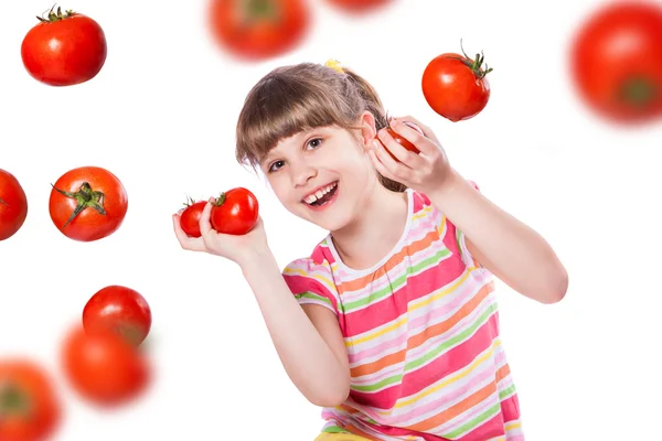 Ragazza con pomodoro su sfondo bianco — Foto Stock