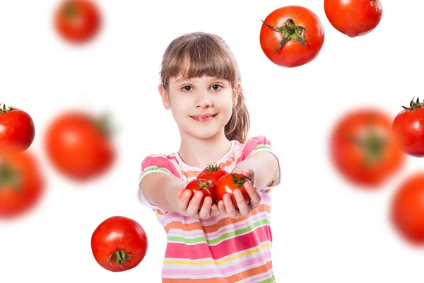 Девушка с помидорами на белом фоне — стоковое фото
