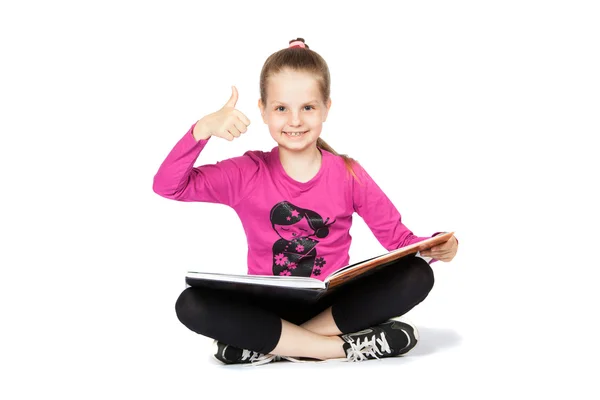 Girl reading a book on white background — Stock Photo, Image