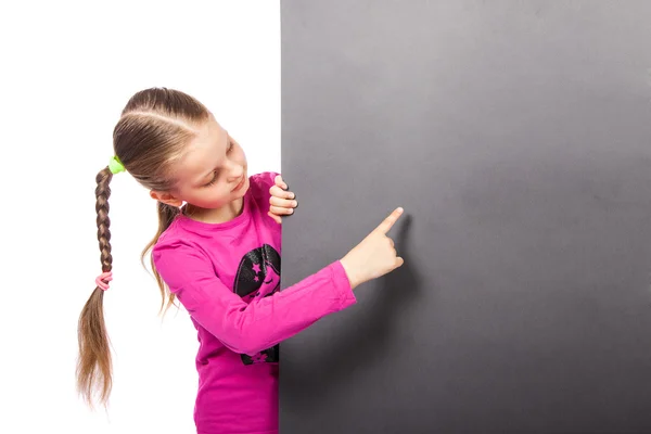 Menina mostrando no cartaz — Fotografia de Stock