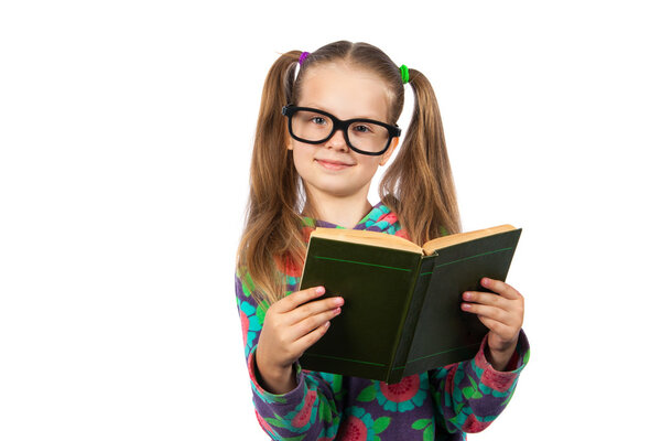 Girl with glasses reading a book