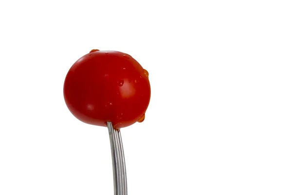 Tomato on fork — Stock Photo, Image