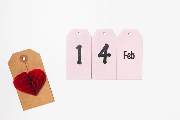 Romantischer Valentinstag-Hintergrund. Preisschild mit rotem Herz und Text 14 Feb — Stockfoto