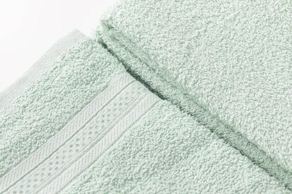 Folded Mint Green Bath Sheet Towels White Background Close Texture —  Fotos de Stock