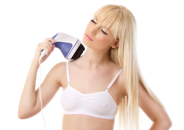 Beautiful blonde woman using massager — Stock Photo, Image