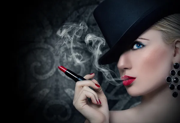 Beautiful blonde girl with cigarette and red lips — Stock Photo, Image