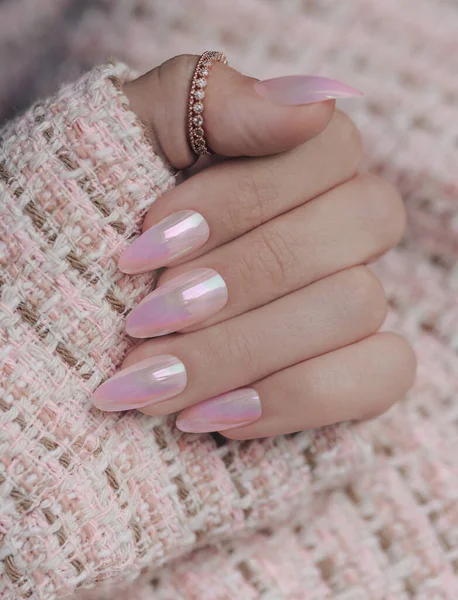 Pink nail manicure. Stylish pastel pink manicure.