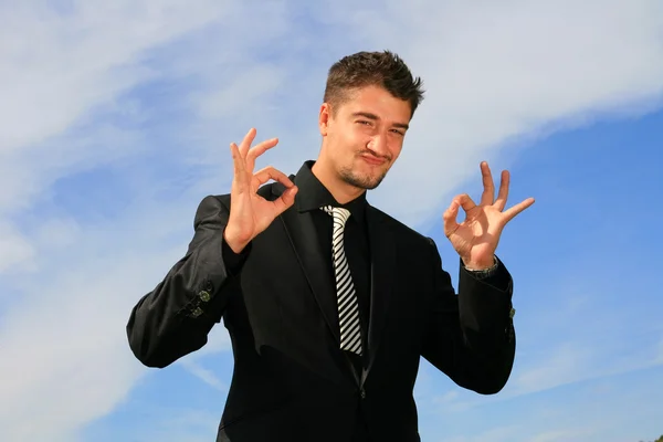 Business man showing okay sign — Stock Photo, Image